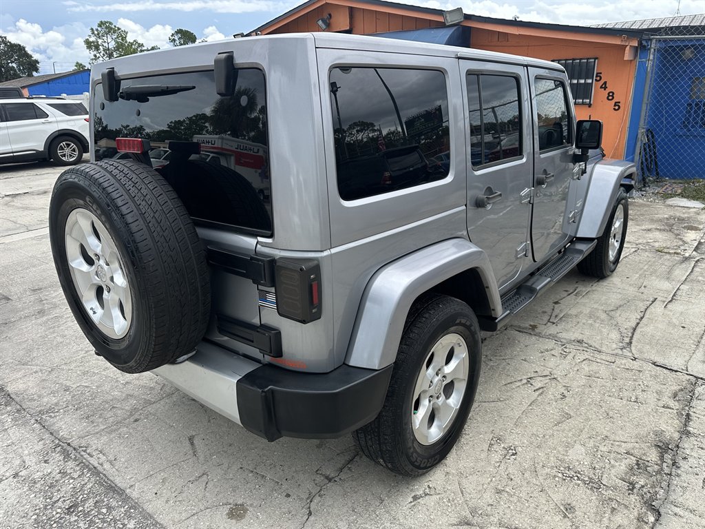 2014 Jeep Wrangler Unlimited Sahara - Photo 6