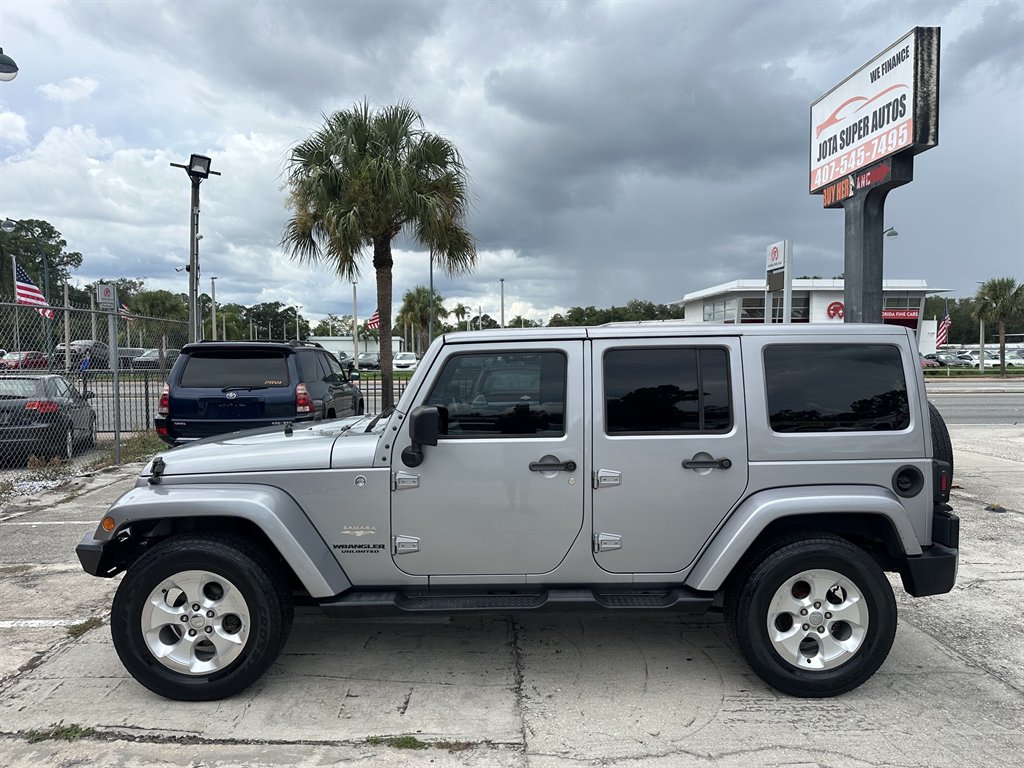 2014 Jeep Wrangler Unlimited Sahara - Photo 9